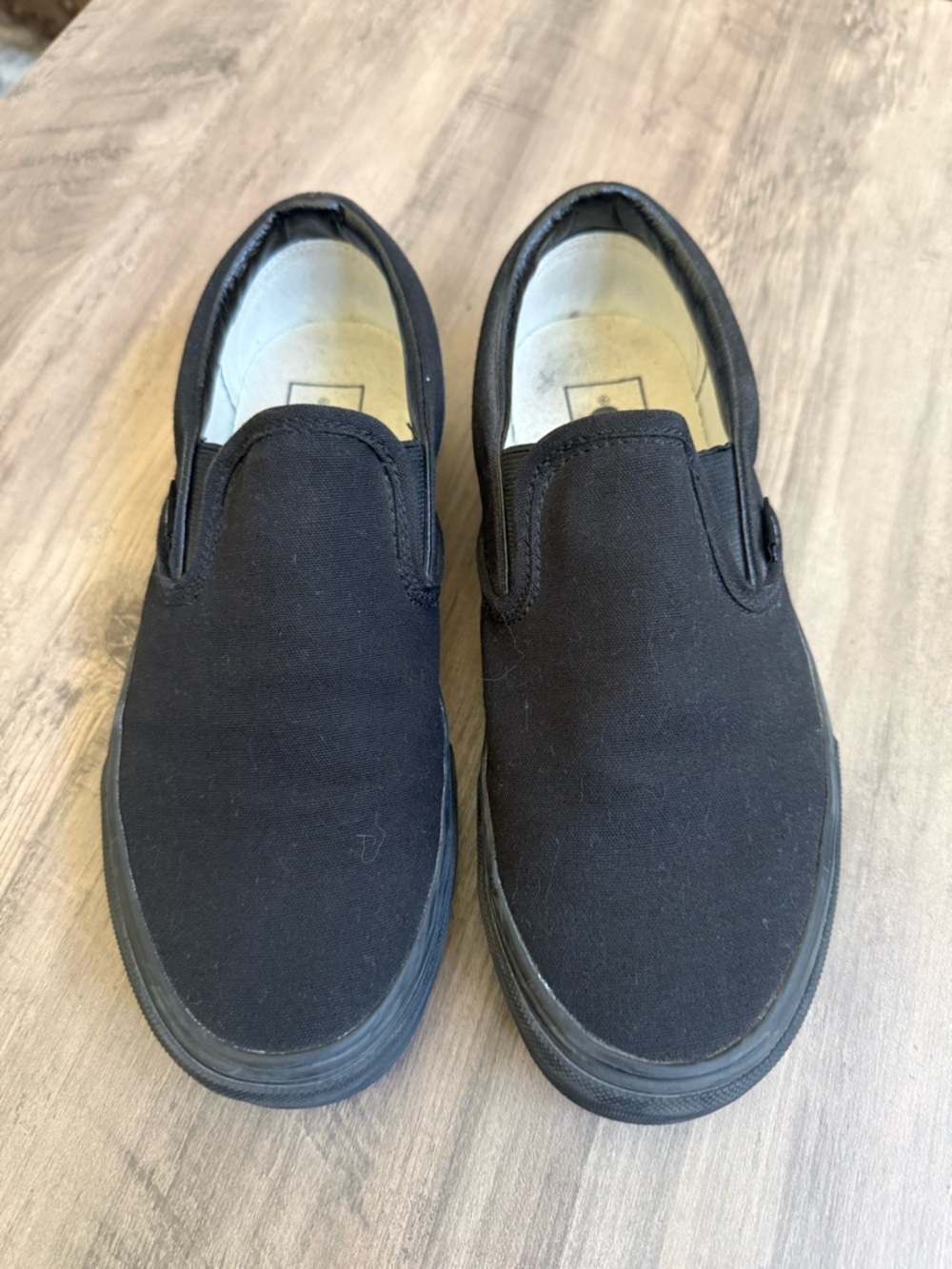 Vans Black Canvas Slip-On Sneakers